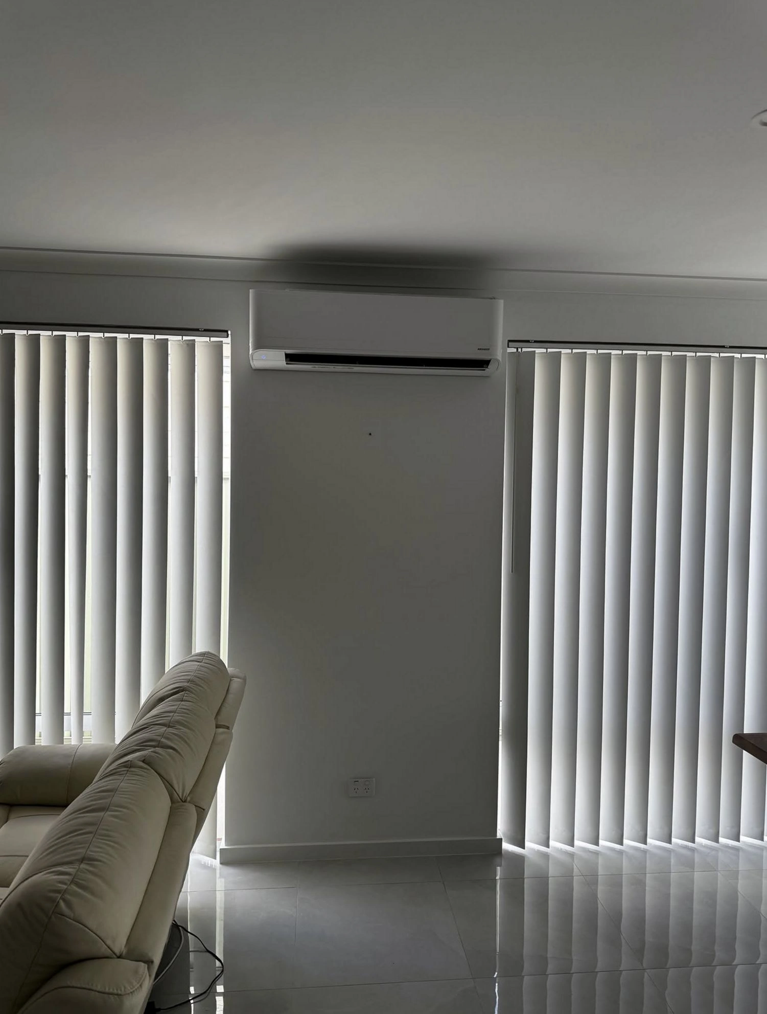HVAC technician installing a residential furnace in a Toledo home